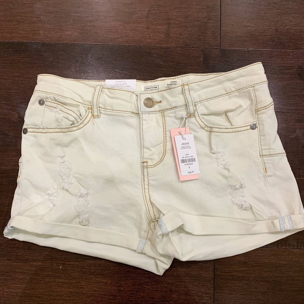 White Denim Shorts with rips